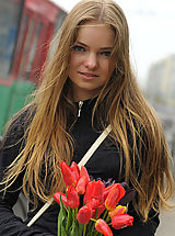 Small Boobs, Although this girl begins with posing in clothes, soon she shows her body in the altogether.