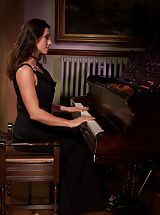 Sexy Legs, Fashionable English Maiden and Kinky Bitch Playing the grand piano in a latex leotard